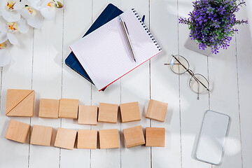 Image showing Message at wooden cubes on a desk background.