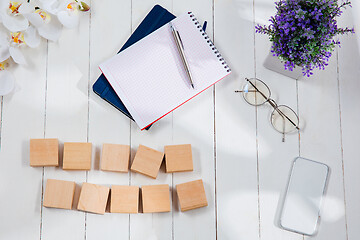 Image showing Message at wooden cubes on a desk background.