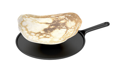 Image showing Frying pan with flying pancake