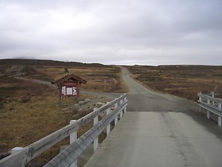 Image showing Mountain road crossing a bridge