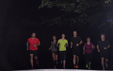 Image showing runners team on the night training