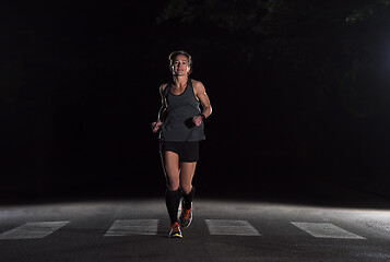 Image showing female runner training for marathon