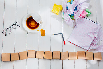 Image showing Message in wooden cubes on a desk background.