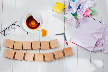 Image showing Message in wooden cubes on a desk background.