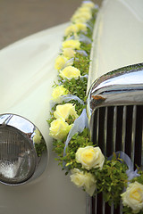 Image showing Wedding Car with yellow flowers