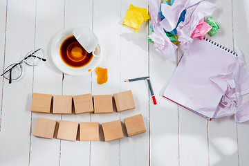 Image showing Message in wooden cubes on a desk background.