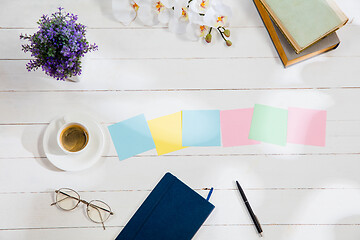 Image showing Message at colorful note papers on a desk background.