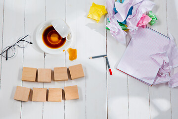 Image showing Message in wooden cubes on a desk background.