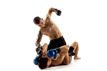 Image showing Two professional boxers boxing isolated on white studio background