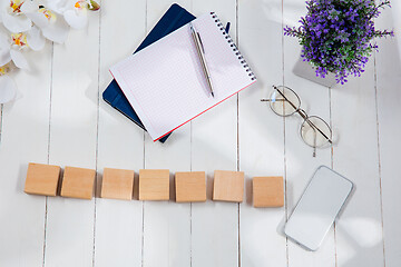 Image showing Message at wooden cubes on a desk background.