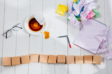 Image showing Message in wooden cubes on a desk background.