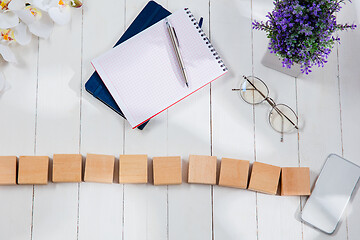 Image showing Message at wooden cubes on a desk background.