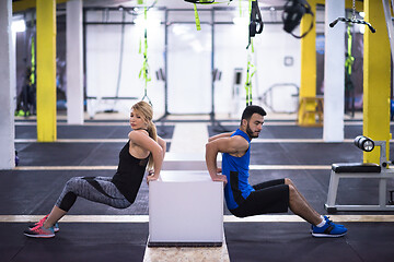 Image showing athletes working out their arms