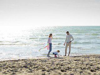 Image showing happy family enjoying vecation during autumn day