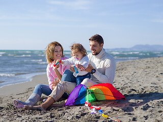 Image showing Young family enjoying vecation during autumn day