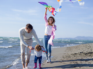 Image showing happy family enjoying vecation during autumn day