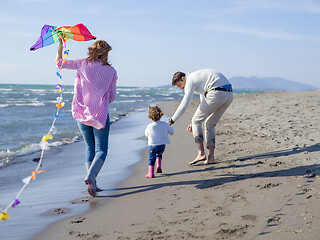 Image showing happy family enjoying vecation during autumn day