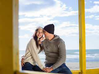 Image showing Couple chating and having fun at beach bar