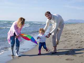 Image showing happy family enjoying vecation during autumn day