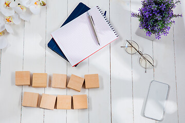 Image showing Message at wooden cubes on a desk background.