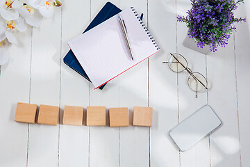 Image showing Message at wooden cubes on a desk background.