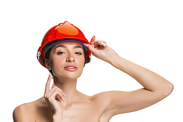 Image showing Portrait of confident female worker in orange helmet