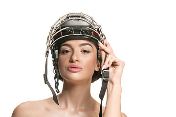 Image showing Female hockey player in helmet and mask