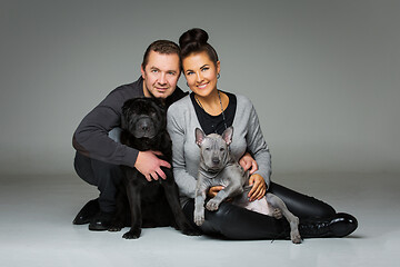 Image showing couple with two dogs