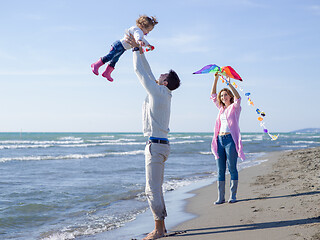 Image showing happy family enjoying vecation during autumn day