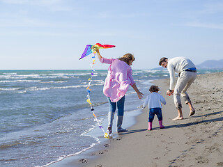 Image showing happy family enjoying vecation during autumn day