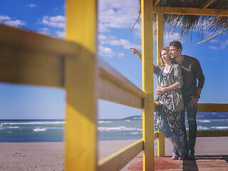 Image showing Couple chating and having fun at beach bar