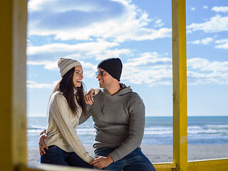 Image showing Couple chating and having fun at beach bar