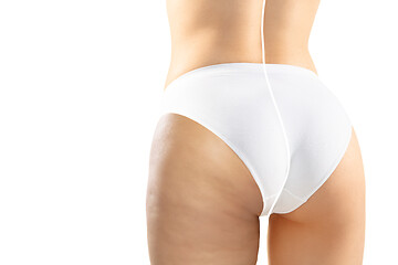 Image showing Overweight woman with fat cellulite legs and buttocks, obesity female body in white underwear comparing with fit and thin body isolated on white background