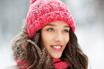 Image showing smiling teenage girl outdoors in winter