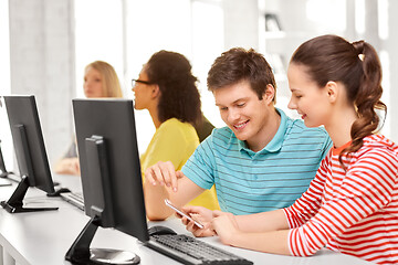 Image showing high school students with smartphone and computer