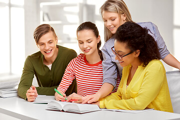 Image showing high school students with books and notebooks