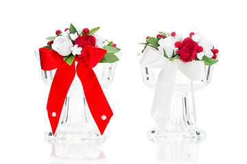 Image showing Crystal glasses with red flower decor