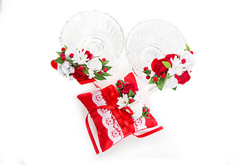 Image showing Crystal glasses with red flower decor