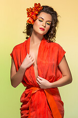 Image showing beautiful girl in orange dress