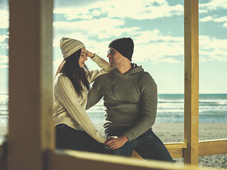 Image showing Couple chating and having fun at beach bar