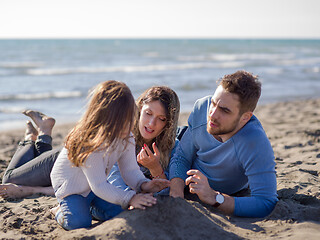 Image showing Young family enjoying vecation during autumn day