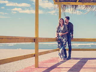 Image showing Couple chating and having fun at beach bar