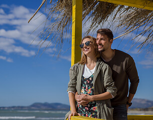 Image showing Couple chating and having fun at beach bar