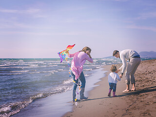 Image showing happy family enjoying vecation during autumn day