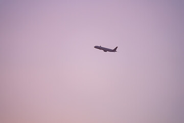 Image showing plane sunset haze