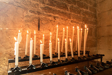 Image showing candles in a church in Italy