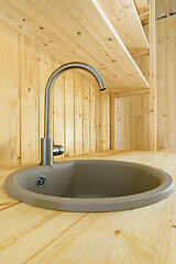 Image showing Sink with mixer close-up in the interior of a wooden house