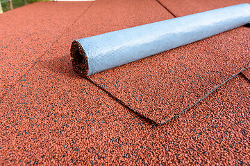 Image showing The roof is finished with red bituminous tiles