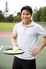 Image showing Asian tennis player