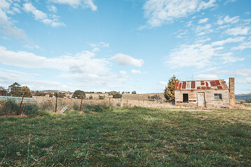 Image showing Old rustic timber homestead with rusting corrugated iron roof